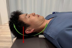 緊張型頭痛セルフケア(顎引く)